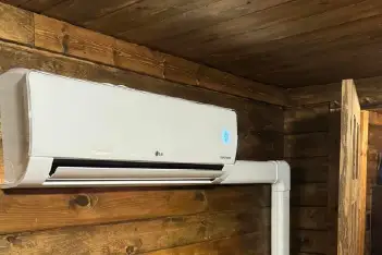 Professional maintenance technician performing annual service